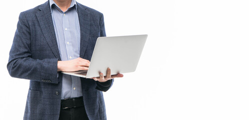 Businessman using a laptop computer and gesturing happiness isolated on white background