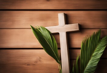 holy cross with green leaves on a wooden background