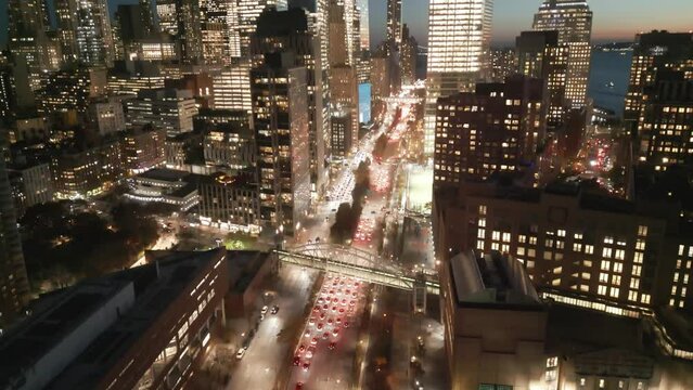New York City View at Dusk, Manhattan at night New York city lights. Night in Manhattan, New York aerial view. New York City, NYC view from drone. NYC, Manhattan skyline. Night city scene with traffic