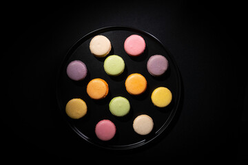 Makarons on Black Plate