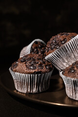 chocolate muffin on a white plate