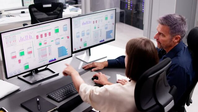 Two People Engaging in Computer Engineering