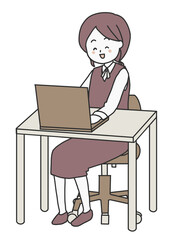 Fototapeta na wymiar パソコンを操作しながら笑顔の女性