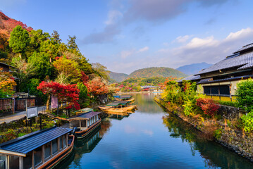 Fototapeta na wymiar Arashiyama Kyoto Japan in autumn season. View of Arashiyama Katsura river form Togetsu or Togetsukyo bridge.