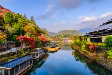 Poster Arashiyama Kyoto Japan in autumn season. View of Arashiyama Katsura river form Togetsu or Togetsukyo bridge. © torjrtrx