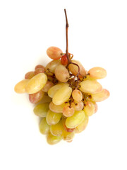 Bunch of organic pink grapes isolated on white background.