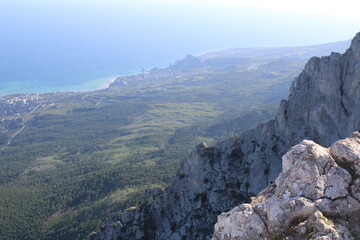 view from the stone cliff to the sea coast.