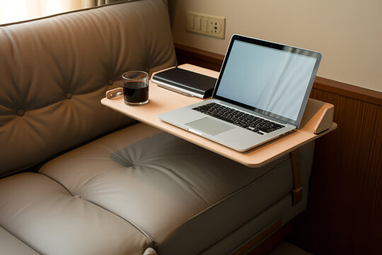 An image showcasing a portable laptop desk in a small apartment - highlighting a space-saving design that is compact and functional - symbolizing adaptability and efficiency in a modern home setting.