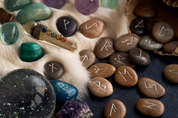 handmade stone runes on white fur