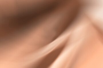 Blurred abstract gradient wave natural peach fuzz background.