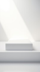 A white platform in a room with a light coming in