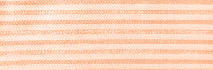Peach fuzz striped cotton texture banner. Fabric textile background header.
