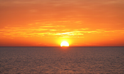 Sunset Over the Sea: Orange Sky Horizon