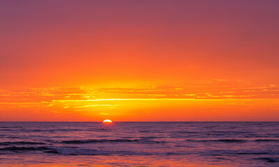 Sunset Over the Sea: Orange Sky Horizon