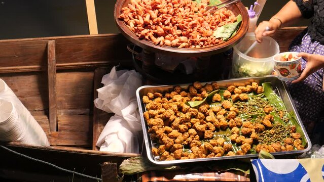 Deep-frying Fish cakes, Floating Market, Thailand