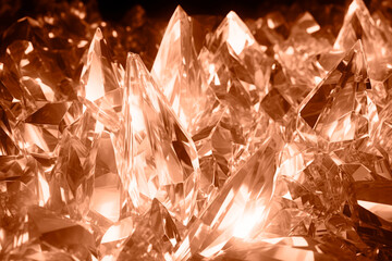 Abstract background of crystals with refraction of light. Crystal peach colored background.