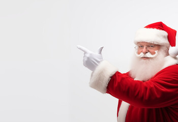 Santa Claus hand point to blank bannner white background,Christmas concept.
