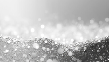 Elegant abstract background of silver glitter with a soft bokeh effect, ideal for festive and luxury themes.