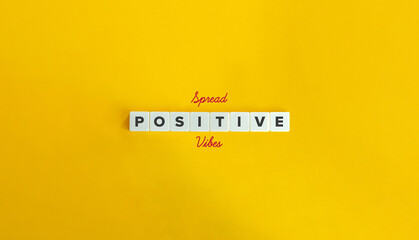 Spread Positive Vibes Message. Share Positivity, Good Energy. Block Letter Tiles and Cursive Text on Yellow Background. Minimalist Aesthetics. - obrazy, fototapety, plakaty