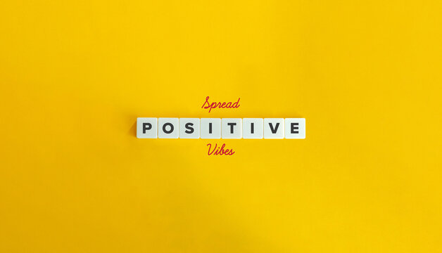 Spread Positive Vibes Message. Share Positivity, Good Energy. Block Letter Tiles and Cursive Text on Yellow Background. Minimalist Aesthetics.