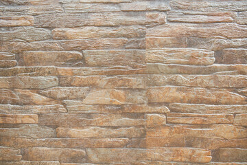 Brown brick wall background texture.