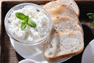 Pieces of bread and cottage cheese for breakfast