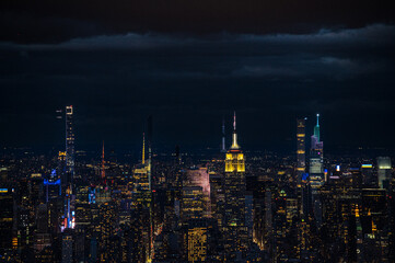 Fototapeta na wymiar Illuminated skyscrapers with Empire State building at night
