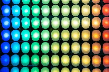 Fototapeta na wymiar Abstract background made of snapbacks with colorful lights