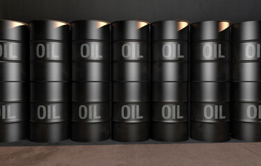 &Ouml;lf&auml;sser vor einer Betonwand