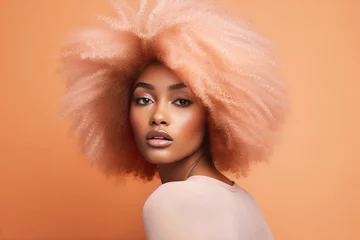 Foto auf Acrylglas Pantone 2024 Peach Fuzz close up portrait of a black woman with peach fuzz color afro on a pastel peach background studio shot