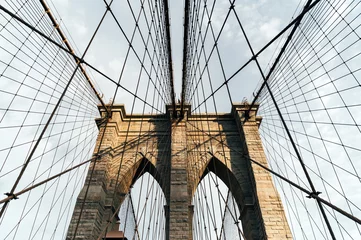 Selbstklebende Fototapeten Iconic Brooklyn Bridge cables and pillars © DavidPrado