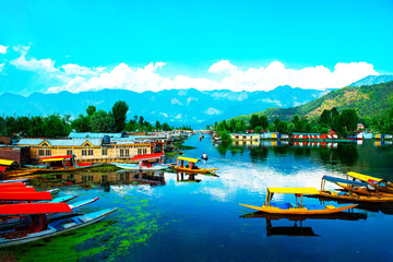 Fototapeta na wymiar Dal Lake and the beautiful mountain range in the background, in the summer Boat Trip, of city Srinagar Kashmir India.