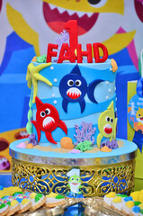 1 year birthday cake design for boys in baby shark theme.