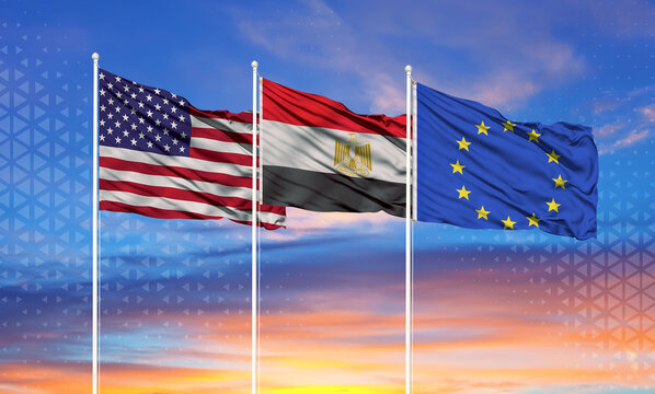 Three realistic flags of European Union, United States and Egypt on flagpoles and blue sky