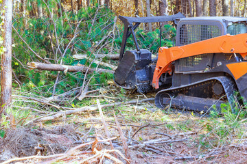 In order to clean forest contractor used tracked general purpose forestry mulcher