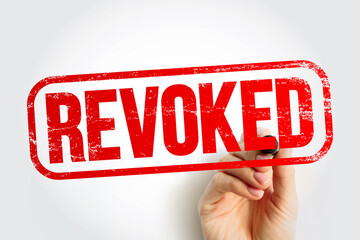 REVOKED text stamp, business concept background