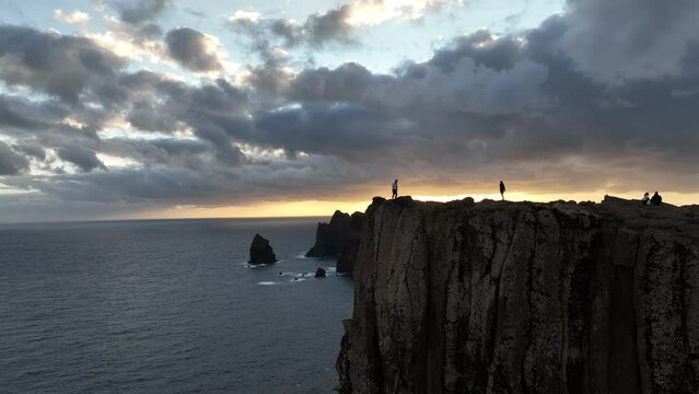 Drone Shot Of Small Group Of People Enjoying The Sunset At Ponta De Sao Lourenco In Canical, Madeira