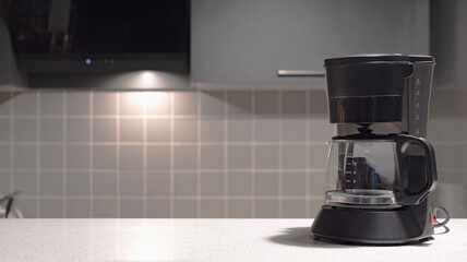 coffee maker on the counter in kitchen with copy space. 