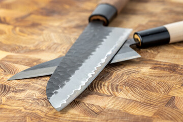 Japanese premium knives released.Damascus steel pattern.Background with a pattern of Damascus steel. - obrazy, fototapety, plakaty