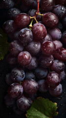 Fresh grapes and leaves with water drops background. Fresh grapes. Fruit background.