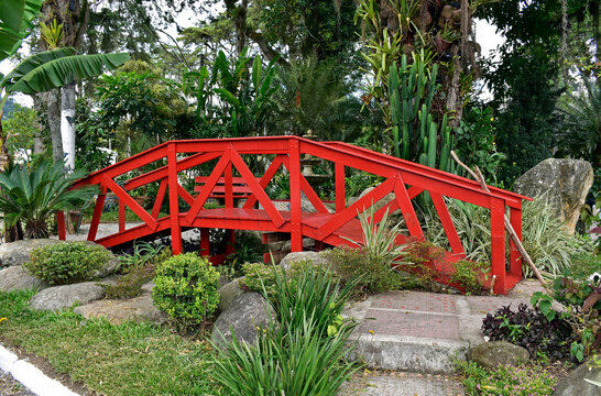 Red wooden bridge on public square in Teresopolis, Rio de Janeiro, Brazil