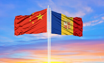 Flag of China and Andorra waving in the wind against white cloudy blue sky together. Diplomacy concept, international relations