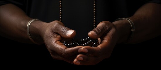 Prayer rosary and hands of black man for worship faith and belief for support help and hope Religion praying and christian person in home for meditation spiritual healing and trust for praise - obrazy, fototapety, plakaty