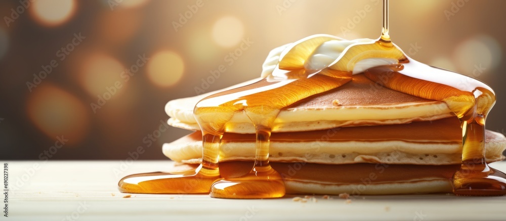 Poster Fluffy buttermilk pancakes with butter and maple syrup. Website header. Creative Banner. Copyspace image