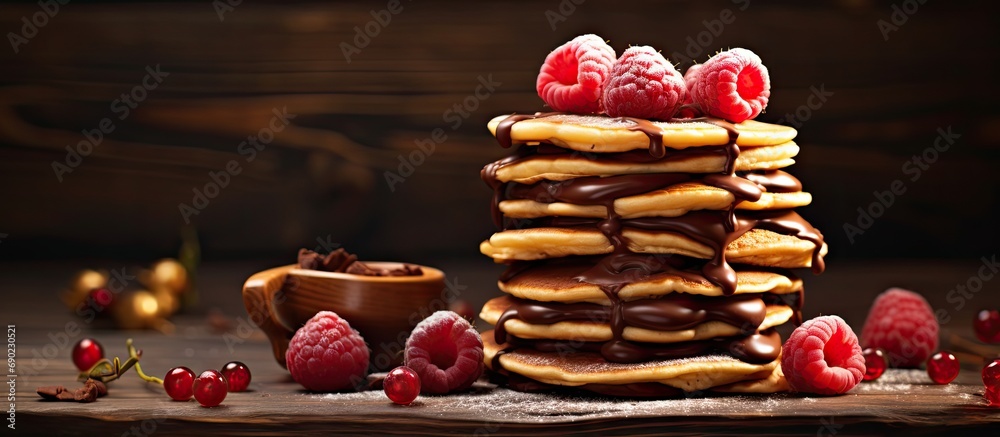 Poster homemade heart shaped pancakes stack with chocolate and raspberries. website header. creative banner