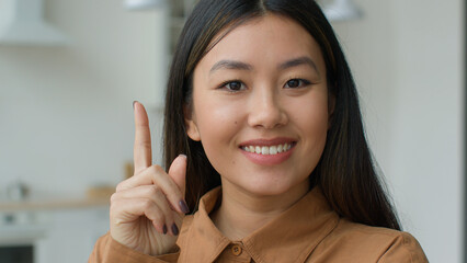 Portrait thoughtful dreaming Asian korean woman girl in kitchen think thought pondering search...