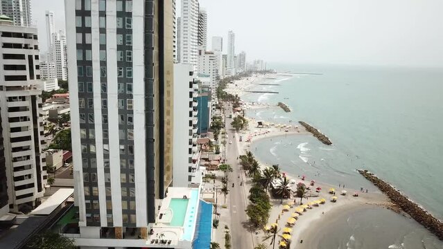Bocagrande, Cartagena. Colombia. Drone Shot of Modern Waterfront Buildings and Hotels on Caribbean Sea. High quality 4k footage. Aerial shot of the beautiful Cartagena city and playa De Bocagrande.