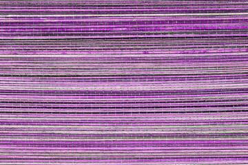 Purple bamboo mat a background or texture