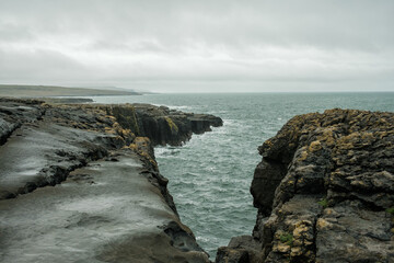 View of the Burren Coast of County Clare near Black Head Lighthouse in Ireland