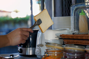 Toast is a popular breakfast menu that hotels serve in the dining room for guests to choose from. Soft and selective focus.